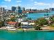 Beautiful waterfront home with stunning city views, private dock and refreshing pool at 520 Belle Isle Ave, Belleair Beach, FL 33786
