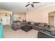Spacious living room featuring tile flooring, comfortable seating, and a large open layout at 7581 Palmer Glen Cir, Sarasota, FL 34240