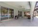 Spacious covered patio with access to the pool and interior at 7581 Palmer Glen Cir, Sarasota, FL 34240