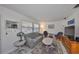 Living room with comfortable seating, area rug, and natural light at 10038 62Nd N Ter # 21, St Petersburg, FL 33708