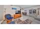 Comfortable living room featuring stylish seating and light wood-look floors with a relaxed vibe at 10038 62Nd N Ter # 21, St Petersburg, FL 33708