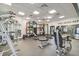 A modern fitness center with a variety of weightlifting and exercise machines for residents at 14605 Chatsworth Manor Cir, Tampa, FL 33626