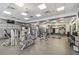 Bright and spacious gym with a variety of modern exercise equipment and motivational wall art at 14605 Chatsworth Manor Cir, Tampa, FL 33626