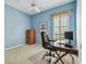 Bright office with large window and modern desk setup at 14605 Chatsworth Manor Cir, Tampa, FL 33626