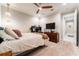 Comfortable bedroom featuring a ceiling fan, neutral paint, dresser, and carpet flooring at 14610 Red Castle Ave, Lithia, FL 33547