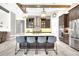 Modern kitchen with a beautiful island, stainless steel appliances, and pendant lighting at 14610 Red Castle Ave, Lithia, FL 33547
