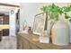 Decorated buffet with view into modern kitchen at 14610 Red Castle Ave, Lithia, FL 33547