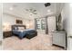 Inviting main bedroom features a plush carpet, ceiling fan, and serene ambiance at 14610 Red Castle Ave, Lithia, FL 33547