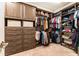 Spacious walk-in closet with custom shelving and ample storage at 14610 Red Castle Ave, Lithia, FL 33547