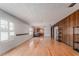 Living room boasts hardwood floors, shuttered windows, and wood-look accents at 1501 W Trapnell Rd, Plant City, FL 33566