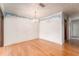 Spacious living room featuring hardwood floors and natural light at 1501 W Trapnell Rd, Plant City, FL 33566