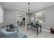 Office area featuring natural light, comfortable seating, and stylish decor for a conducive work environment at 15618 Shoal Creek Pl, Odessa, FL 33556