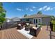 Inviting outdoor deck with stylish seating area, perfect for relaxation and entertaining with nice backyard and exterior views at 15618 Shoal Creek Pl, Odessa, FL 33556