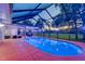 Stunning backyard pool with screened enclosure provides a private outdoor retreat for relaxation and recreation at 15618 Shoal Creek Pl, Odessa, FL 33556