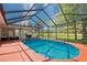 Stunning pool area featuring dining, seating and large yard at 15618 Shoal Creek Pl, Odessa, FL 33556