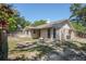 Backyard showcasing the exterior with a wooden fence and ample space for outdoor activities at 18406 Sterling Silver Cir, Lutz, FL 33549