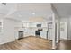 Modern kitchen with stainless steel appliances, white cabinetry and light countertops at 18406 Sterling Silver Cir, Lutz, FL 33549