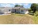 Charming single-story home featuring manicured landscaping and a welcoming front entrance at 2202 Yalta Ter, North Port, FL 34286