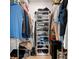 Organized walk-in closet features shelving, hanging racks, and ample storage space at 2958 Macalpin N Dr, Palm Harbor, FL 34684