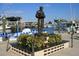 Bronze statue honoring Tarpon Springs' heritage with marina, boats, and vibrant waterfront backdrop at 2958 Macalpin N Dr, Palm Harbor, FL 34684