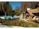 Lake Tarpon Lodge with swimming pool, and outdoor seating at 2958 Macalpin N Dr, Palm Harbor, FL 34684