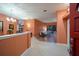 Spacious living room with tile flooring, neutral walls and sliding glass doors to the outdoor patio at 3036 Rainbow Ct, Safety Harbor, FL 34695