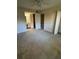 Spacious bedroom featuring a walk-in closet and ensuite bathroom at 3046 Eastland Blvd # J106, Clearwater, FL 33761
