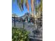 Community area with table and chairs, a grill and tropical landscaping at 3046 Eastland Blvd # J106, Clearwater, FL 33761