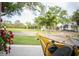 Inviting exterior view featuring lush landscaping, a vibrant kayak, and a glimpse of the serene neighborhood at 3520 Poplar Ne St, St Petersburg, FL 33704