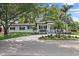 Inviting single-story home featuring a well-manicured lawn and driveway at 3520 Poplar Ne St, St Petersburg, FL 33704