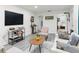 Well-lit living room with a contemporary design, showcasing the open floor plan at 3822 W Euclid Ave, Tampa, FL 33629