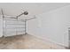 Spacious two car garage featuring an automatic garage door at 402 Abigail Rd, Plant City, FL 33563