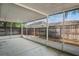Enclosed screened porch showcasing privacy and offering an ideal space for outdoor enjoyment at 402 Abigail Rd, Plant City, FL 33563