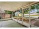 Enclosed screened porch providing an ideal space for relaxation and enjoying neighborhood views at 402 Abigail Rd, Plant City, FL 33563