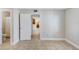 View of the bathroom accessible from bedroom through hallway and closet at 455 Alt 19 S Hwy # 81, Palm Harbor, FL 34683