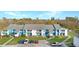 Well-maintained community buildings with lush landscaping and convenient parking at 455 Alt 19 S Hwy # 81, Palm Harbor, FL 34683