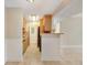 Efficient kitchen with modern appliances, breakfast bar, and seamless flow to living spaces at 455 Alt 19 S Hwy # 81, Palm Harbor, FL 34683