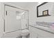 Bathroom featuring subway tile, shower, and granite vanity countertop at 4806 Bay Crest Dr, Tampa, FL 33615