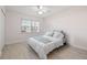 Cozy bedroom with lots of natural light, ceiling fan, and wood-look flooring at 4806 Bay Crest Dr, Tampa, FL 33615