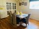 Inviting dining room featuring an elegant chandelier and hardwood flooring at 4904 E River Hills Dr, Tampa, FL 33617