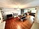 Open concept living and dining area with hardwood floors, plenty of space to relax and dine at 4904 E River Hills Dr, Tampa, FL 33617