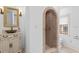 Elegant bathroom featuring a marble shower and a vessel sink with custom cabinetry at 608 Orange Ave, Clearwater, FL 33756