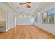 Large, airy bedroom with hardwood floors, ample natural light, and a closet at 608 Orange Ave, Clearwater, FL 33756