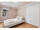 Bedroom featuring hardwood floors, and a closet with doors at 608 Orange Ave, Clearwater, FL 33756