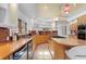 Well-appointed kitchen featuring a large island, custom cabinetry, and stainless steel appliances at 608 Orange Ave, Clearwater, FL 33756