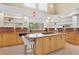Well-appointed kitchen with center island cooktop and custom cabinet storage at 608 Orange Ave, Clearwater, FL 33756