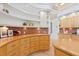 Stylish kitchen featuring custom cabinetry, tiled backsplash, and modern appliances at 608 Orange Ave, Clearwater, FL 33756