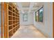 Office featuring tile floors, large built-in shelves, and large windows for natural light at 608 Orange Ave, Clearwater, FL 33756