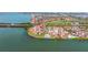 Beautiful aerial view of waterfront condos with pools and parking, near beaches and a golf course at 6372 Palma Del Mar S Blvd # 1007, St Petersburg, FL 33715