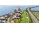 Stunning aerial view of waterfront condos, golf course, and the Gulf of Mexico in a luxurious community at 6372 Palma Del Mar S Blvd # 1007, St Petersburg, FL 33715